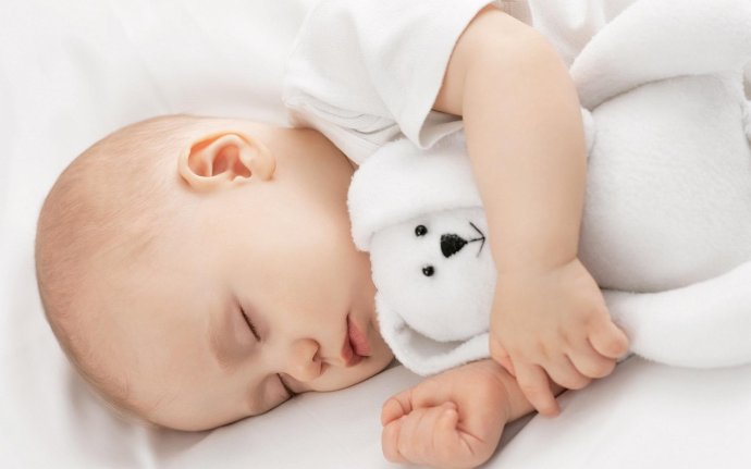 新生婴儿睡觉不踏实是什么原因？应该怎么办