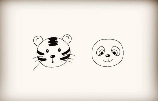 用圆形画动物老虎和熊猫头像简笔画